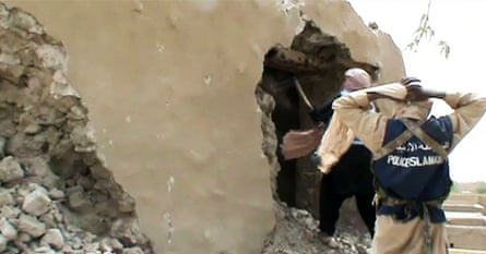 Video shows militants destroying an ancient shrine in Timbuktu.