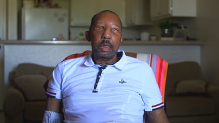 a man looking at a camera