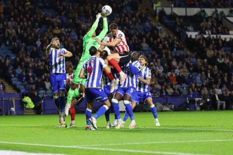 Sunderland’s Dan Ballard contests a high ball with Sheffield Wednesday goalkeeper Devis Vasquez during last night’s match between the sides at Hillsborough.