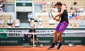Alexander Zverev returns the ball during his win over Roman Safiullin.