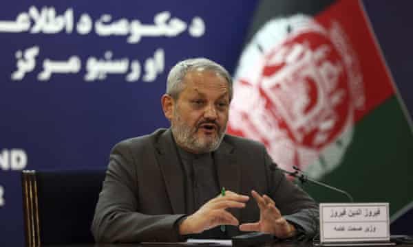 Afghanistan’s minister of public health, Ferozuddin Feroz. speaks at a press conference in Kabul on 16 March.