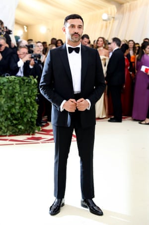 Burberry's new chief creative officer, Riccardo Tisci, wore Burberry, naturally. The designer has pieces from his own design archive on display in the exhibition