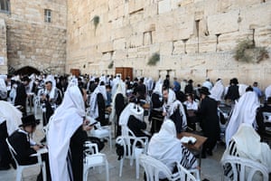 Orthodox Jews gathering at a wall in the Old City of Jerusalem