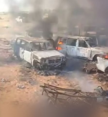 A screen grab from unverified footage shared by Sudanese activists that purports to show bodies and burnt vehicles in El Fasher.
