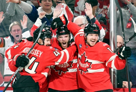 4 Nations Face-Off final: Canada beat USA in sudden-death overtime – as it happened Canada's Connor McDavid, center, celebrates with teammates Josh Morrissey and Sam Reinhart.