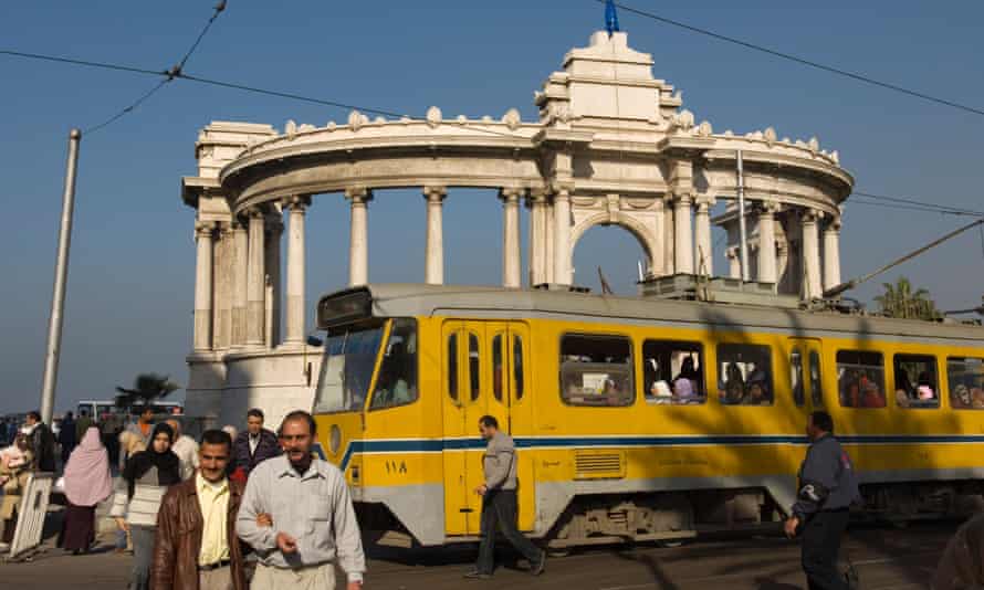 Tram passing the Neoclassical Unknown Soldier Monument, Alexandria