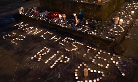 Memorial candles at a vigil for the victims of the Manchester Arena bombing in St Ann’s Square, Manchester, on Monday night.