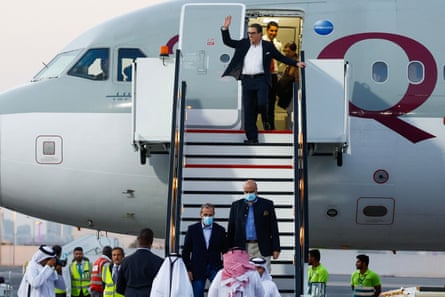 US citizens Siamak Namazi (C-back), Emad Sharqi (bottom-L) and Morad Tahbaz (bottom-R) disembark from a Qatari jet upon their arrival at the Doha International Airport in Doha on September 18, 2023.
