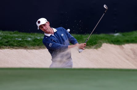 David Puig plays a bunker shot during the final round of the Dubai Desert Classic