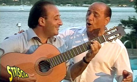 Berlusconi, right, with Mariano Apicella during a private party at Berlusconi’s summer residence, 2003.