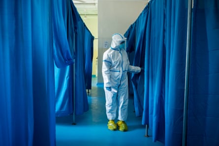 A nurse at the treatment ward checks on patients with Covid 19 at De Martini hospital.