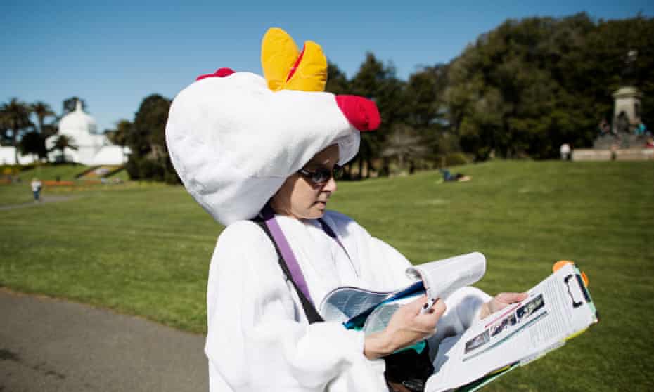 Carol Misseldine wearing a chicken suit, collecting signatures for the farm animal legislation. 