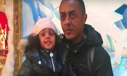 Mohamednur Tuccu with and his three-year-old daughter Amaya