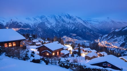 Alpine town in winter at dusk
