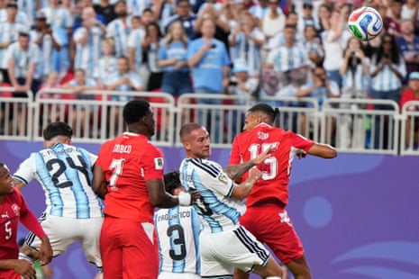 Argentina’s Alexis Mac Allister heads in the opener