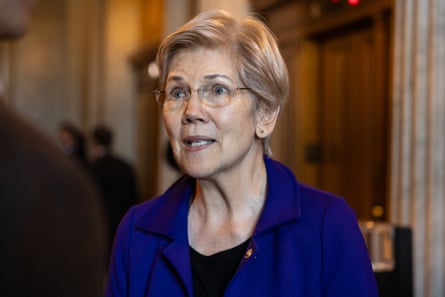 Elizabeth Warren in a navy blue jacket