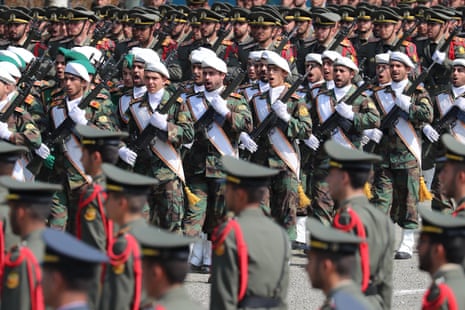 Iranian soldiers parade during the annual army daycelebration at a military base in Tehran.