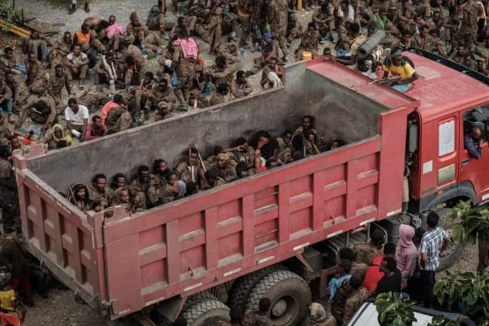 Wounded captive Ethiopian soldiers arrive on a truck at the Mekele Rehabilitation Center in Mekele, Ethiopia, 2 July