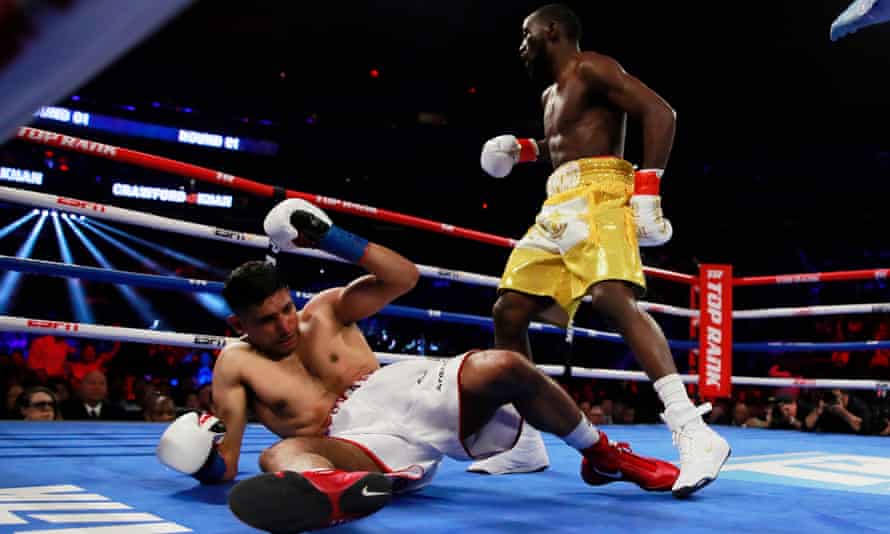 Terence Crawford puts Amir Khan on the canvas in 2019.