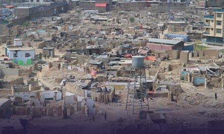 A settlement that has been partially demolished. many building have been reduced to low walls.