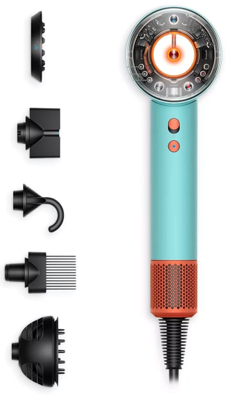 The teal and orange Dyson Supersonic Nural hairdryer with several black attachments lined up alongside it, all on a white background