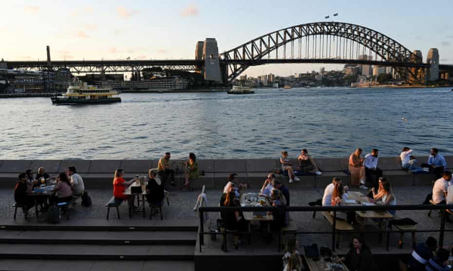 Patrons dine-in at a bar by Sydney harbour in the wake of coronavirus disease (COVID-19) regulations easing