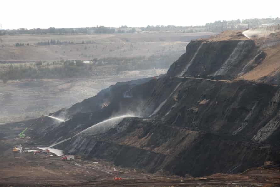 Firefighters battle a blaze at the Hazelwood open-cut coalmine in Victoria in March 2014.