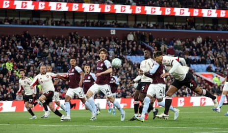 Virgil van Dijk of Liverpool scores a goal to make the score 1-1 at Aston Villa.