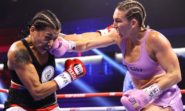 Erica Farias (left) and Mikaela Mayer exchange punches during their fight for the WBO lightweight championship in Las Vegas.