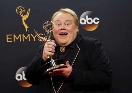 Louie Anderson poses backstage with his award for Best Supporting Actor in a Comedy Series.