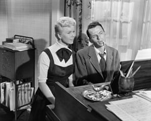 Doris Day and Frank Sinatra singing at the piano in the film Young at Heart, 1954
