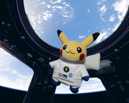 In this image, released (21/9/26), Astronaut Pikachu floats inside the International Space Station Cupola. //Pikachu has joined the International Space Station crew. The cute yellow character appeared in the orbital platform's cupola as part of a collaboration between the space agency and The Pokémon Company International. The special Astronaut Pikachu plush appears to mark the launch of the upcoming World Space Week 2026 from October 4–10. The partnership includes exhibitions at ESA sites and museums across Europe, exclusive ESA and Pokémon merchandise, and more.