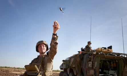 A French soldier launches a drone in northern Burkina Faso.