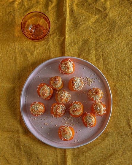 ‘I do everything except baking them in advance’: baked apricots with almonds and sesame.