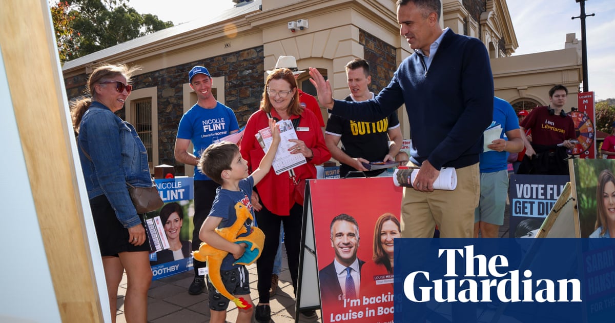 Swimmers, dogs and democracy sausages: Australian election day – in ...