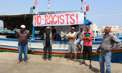 Tunisian fishermen gathered in Zarzis to protest against the C-Star. A port official said authorities would ‘never let in racists’.