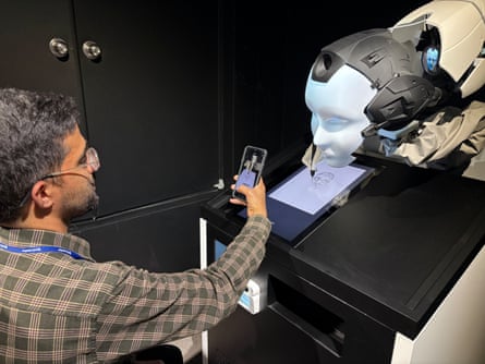 Raphael Rashid has his portrait drawn at Galaxy Robot Park.