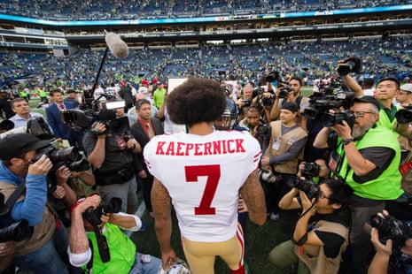 San Francisco 49ers quarterback Colin Kaepernick meets with Seattle Seahawks wide receiver Doug Baldwin.