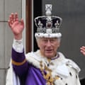 King Charles and Queen Camilla wave from the balcony of Buckingham Palace following their coronation in London on 6 May 2023.