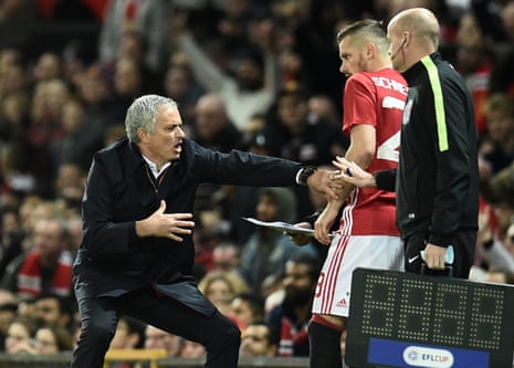 Manchester United José Mourinho gestures as Morgan Schneiderlin prepares to come on.