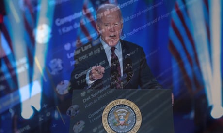 Composite image featuring a computer screen with a close-up on the Synthetic Partys AI-driven chatbot and US president Joe Biden