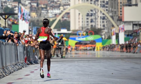 Kenya’s Jemima Jelagat Sumgong runs to the finish line to win the women’s marathon at the 2016 Rio Olympics.