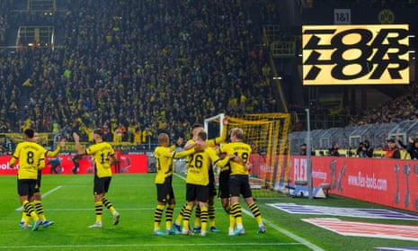Dortmund's Julian Brandt celebrates with his teammates after scoring the only goal of the game