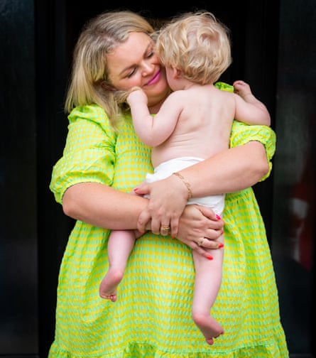 Writer Rose Stokes photographed at her home in Bath, July 2025, holding her young son