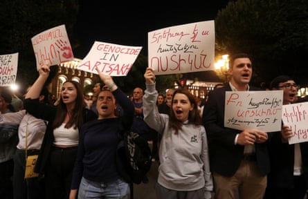 Protesters in Yerevan hold up signs referring to ‘Artsakh’, the Armenian name for Karabakh.
