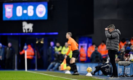 Kieran McKenna looks dejected on the touchline against Manchester City.