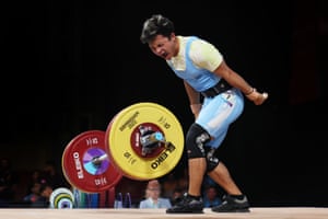 Lalrinnunga Jeremy of India screams after performing a clean &amp; jerk during Men’s 67kg final.