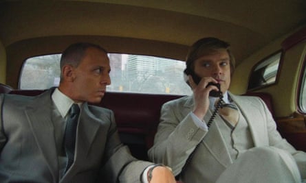 Jeremy Strong and Sebastian Stan in the back of a car.