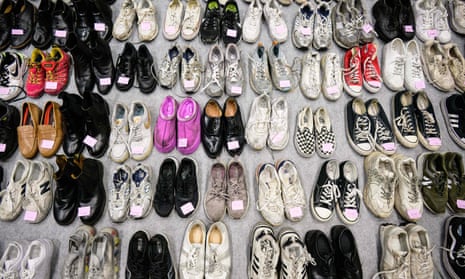 Shoes retrieved by police from the scene of the fatal Halloween crowd surge in Seoul.
