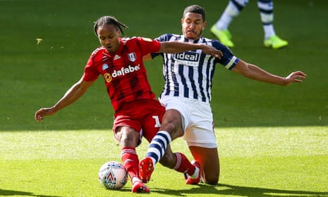 Bobby Reid of Fulham challenges Jake Livermore of West Bromwich Albion.